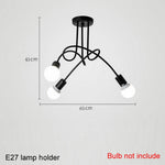 suspension lumineuse moderne noir doré ampoules blanches structure spirale fixation câbles métallique