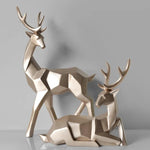 statuette cerf doré noir bleu blanc géométrique moderne ornement porte bonheur décoration intérieure transparent