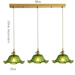 suspension lumineuse vintage vert doré motifs géométriques ampoules câbles chaînes métal