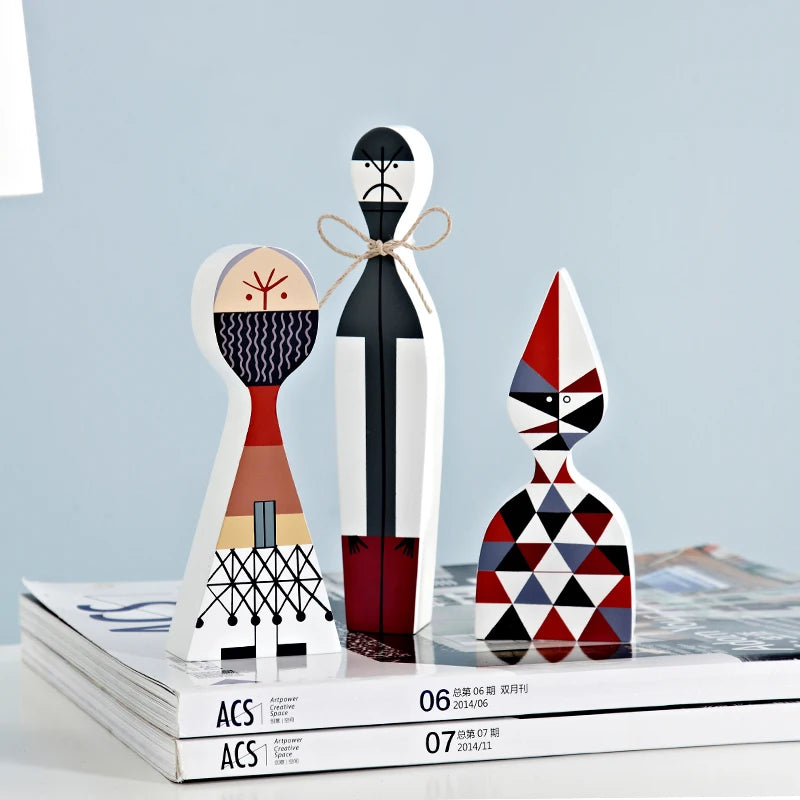 figurines decoratives modernes abstraites geometriques blanc noir rouge bleu gris beige triangles lignes noel