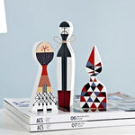 figurines decoratives modernes abstraites geometriques blanc noir rouge bleu gris beige triangles lignes noel