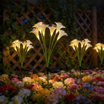 lampions solaires fleurs lys blanc jaune rose modernes extérieurs patio jardin piquet métallique led