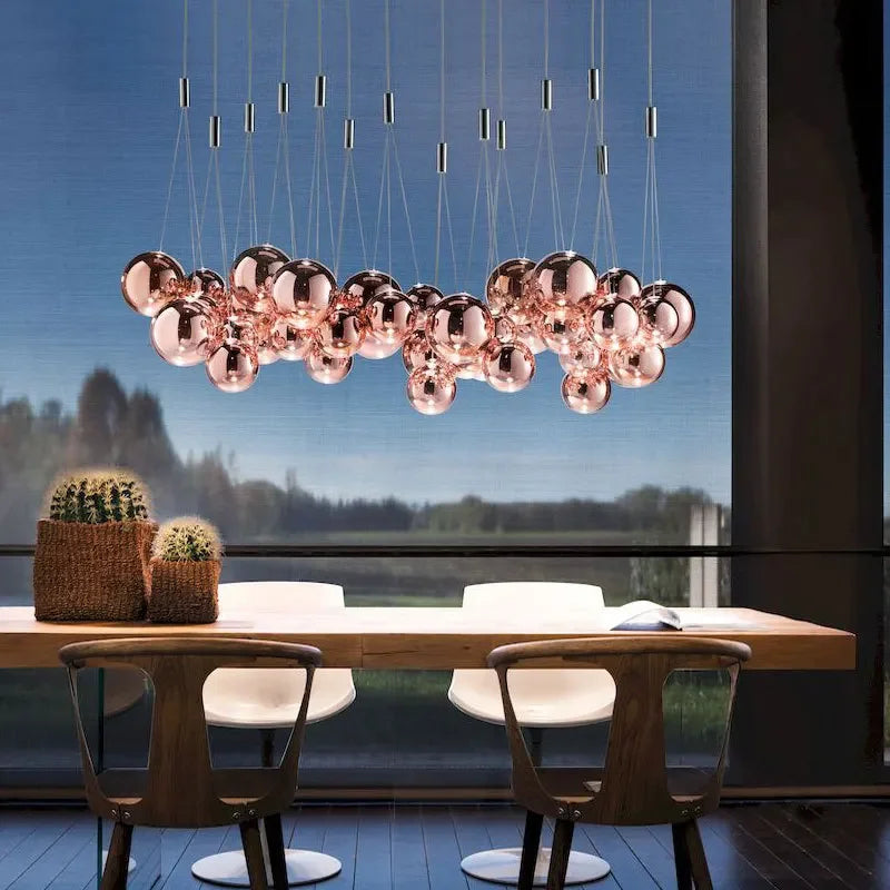 suspension lumineuse moderne sphères brillantes or argent transparentes chambre salle manger