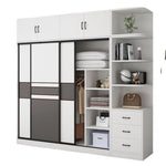 armoire moderne minimaliste blanc gris panneaux rectangulaires vêtements suspendus boîtes rangement jouets poignées porte