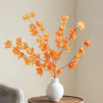 décoration intérieure bouquet fleurs artificielles rose naturel blanc orange rouge bleu vase minimaliste