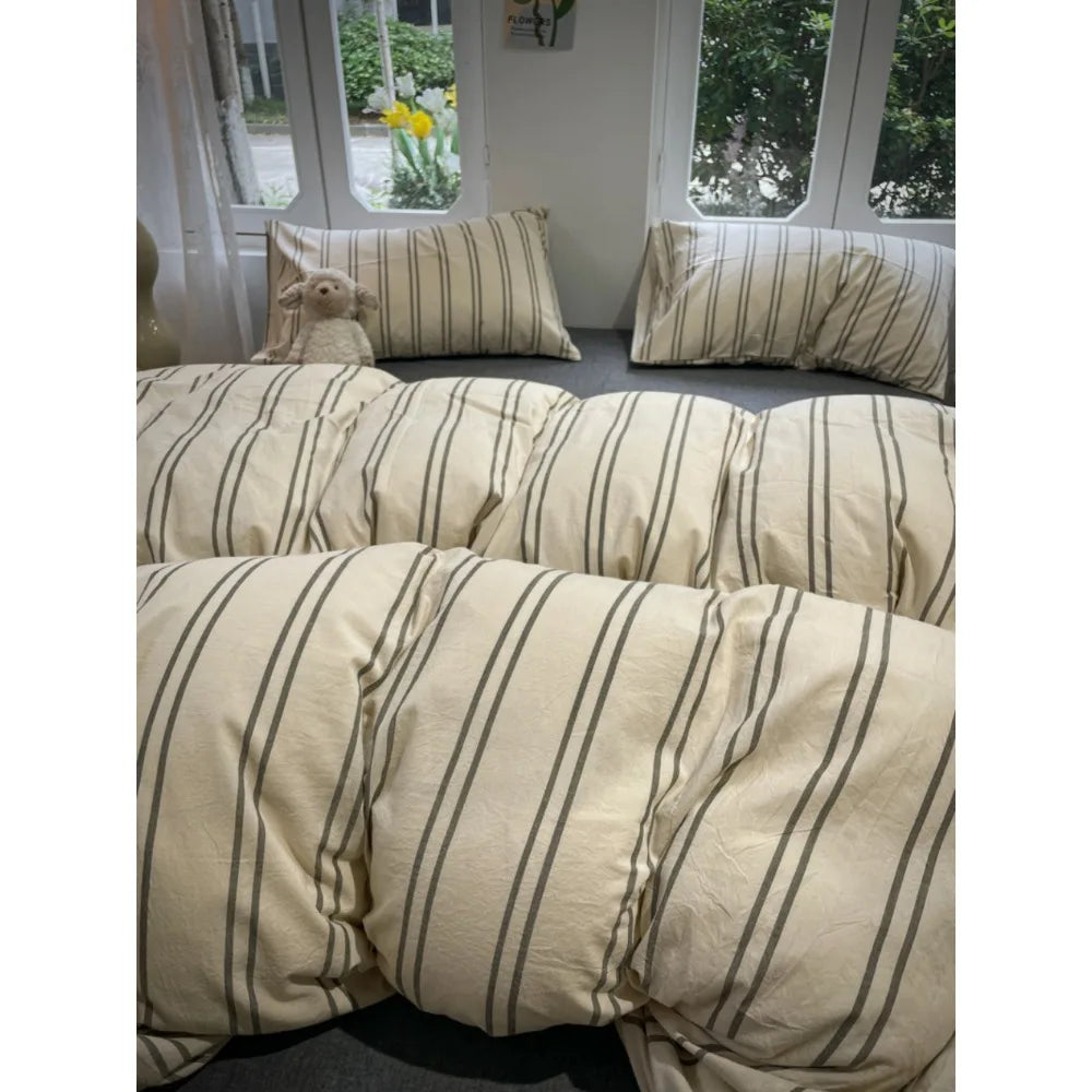 Taies d'oreiller assorties à la housse de couette rayée