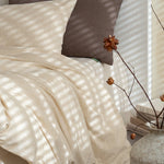 drap housse couette taies d'oreiller literie lin texturé beige taupe minimaliste naturel