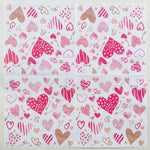 serviettes papier décoratives coeurs motifs romantiques blanc rouge rose doré