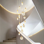 suspension lumineuse moderne cristal transparent dorées salon restaurant chambre principal