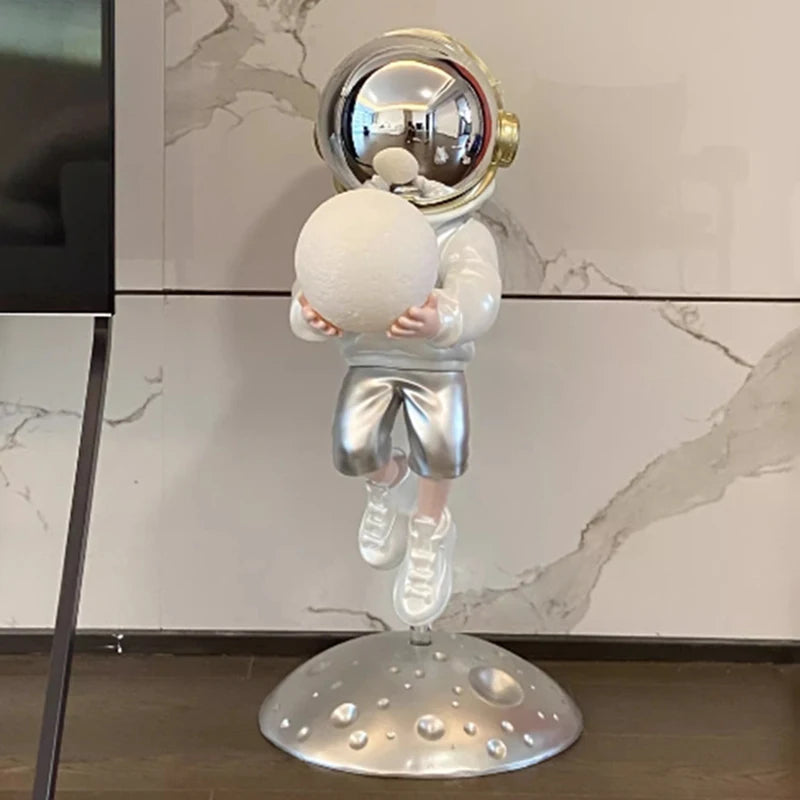 statuette astronaute résine couleur changeante doré argenté rose jaune moderne brillant métallique fixations
