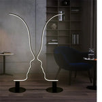lampe sol silhouette visage humain blanc noir contemporain minimaliste interrupteur bouton aluminium