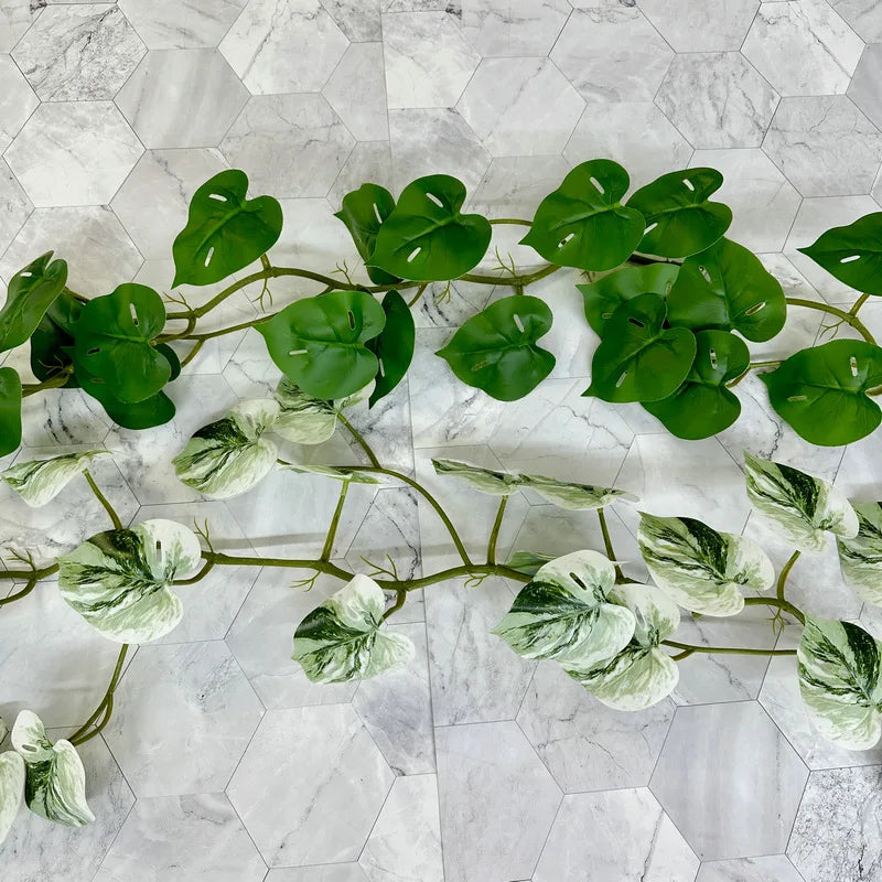 guirlande végétale artificielle feuilles ovales vert veinées tiges extérieure décoration naturelle exposition accrochée