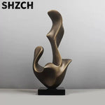 sculpture abstraite bronze patiné marbre blanc salon décoration nouvelle année noël mariage anniversaire valentin