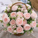 décoration intérieure moderne bouquet fleurs artificielles rose soie verte vase transparent chambre salon