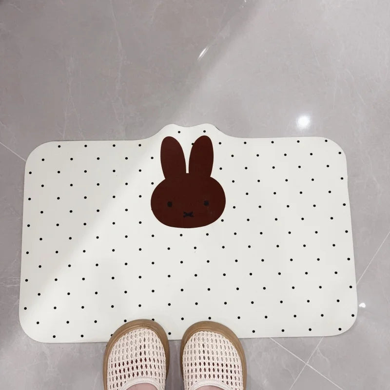 tapis sol absorbant rapide anti dérapant salle bain blanc noir points noirs visage lapin