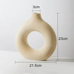vases modernes roseclair beige noir bougies fleurssséchées décorationintérieure texturegrained minimaliste setdeco
