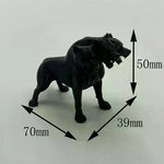 figurine chien trois têtes cerbère noire texture granuleuse mythologique fantastique