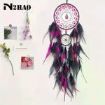 attrape rêves plumes violet noir rose traditionnel artisanal concentrique métal