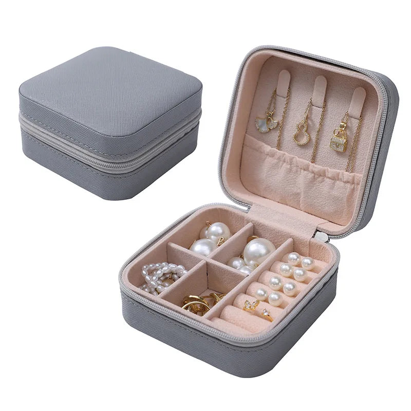 boîte bijoux simili cuir vert pastel moderne fermeture glissière blanc rose pâle boucles doreilles