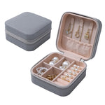 boîte bijoux simili cuir vert pastel moderne fermeture glissière blanc rose pâle boucles doreilles
