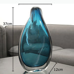 vase moderne transparent bleu marbré décoration intérieure fleur artificielle arrangement table