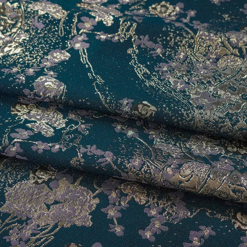 tissu brodé floral texturé bleu foncé violet or luxueux polyester 150cm