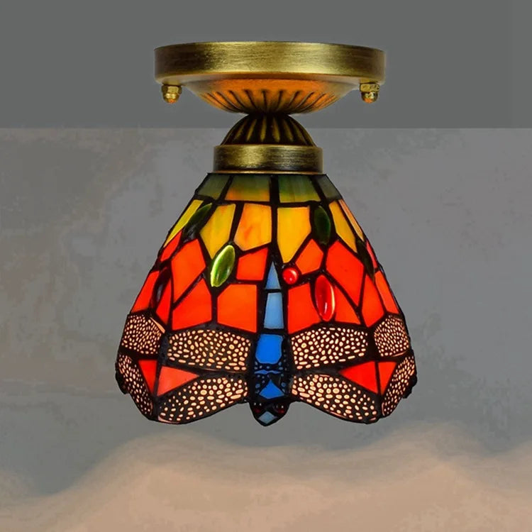 lampe art déco tiffany or bleu rouge verte jaune marron motifs floraux géométriques vis