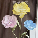 décoration mariage fleurs artificielles papier bleu rose violet jaune extérieur champêtre