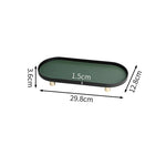plateau ovale moderne plateau rangement métal couleur beige doré matériau mat opacité vis dorées