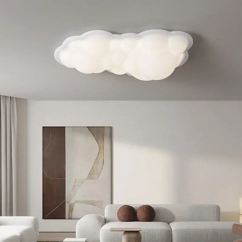 luminaire suspendu nuage moderne sphères lumineuses transparence partielle minimaliste fixations câbles métalliques
