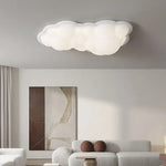 luminaire suspendu nuage moderne sphères lumineuses transparence partielle minimaliste fixations câbles métalliques