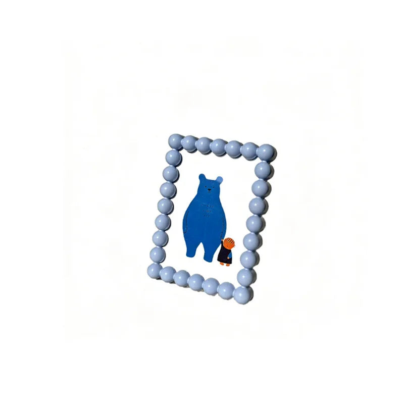 cadres photo naïfs enfants motifs fleurs théières ours chats couleur rose bleu orange