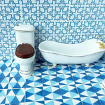 carreaux sol mur résine bleu blanc vert beige géométrique moderne triangles fleurs