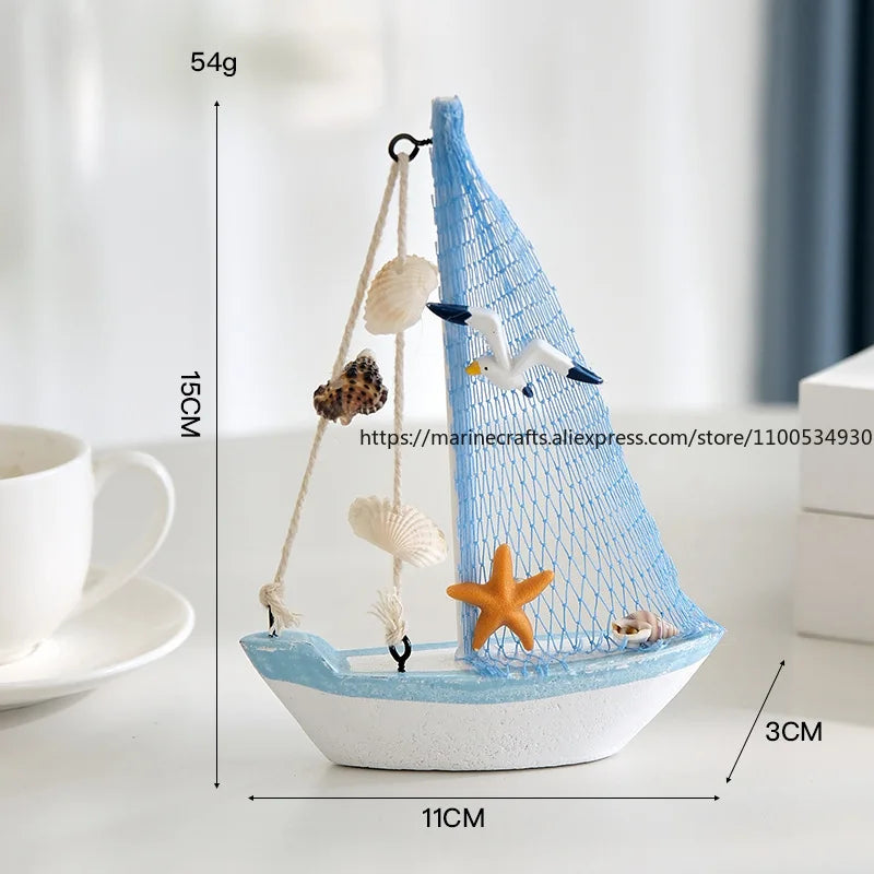 décoration maison bateau voile miniature blanc bleu clair coquillage étoile mer oiseau filet pêche