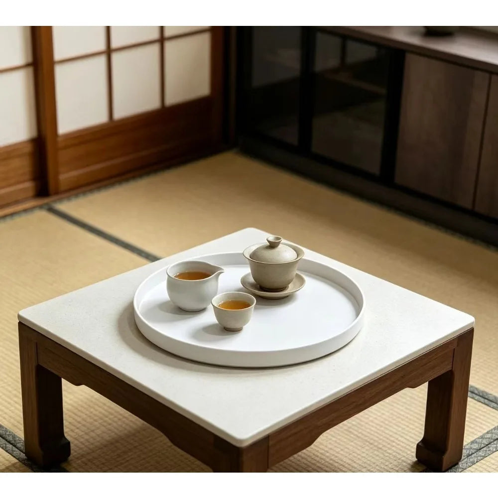 plateau rond blanc surface texturée moderne rangement cosmétiques épices bougies parfumées théière fruits gâteaux