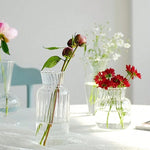vases transparents modernes rayures verticales poignée métallique décoration intérieure table centrale pièces