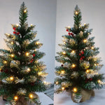 Sapin de Noël miniature 60cm en couleur olive sur table