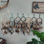 attrape rêves traditionnel plumes noir bleu beige marron gris decoration interieur artisanal