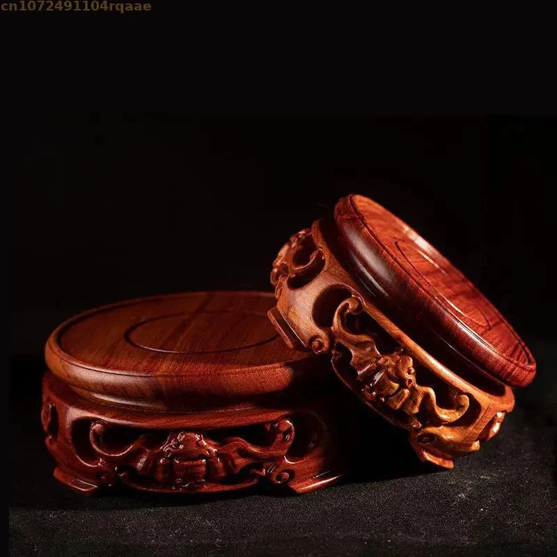 base sculptée bois rouge brun sculptures détaillées motifs floraux artisanal traditionnel support ornement maison