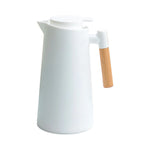 carafe thermique blanc vert pastel rose pâle noir poignée bois ouverture fente bouchon évacuation
