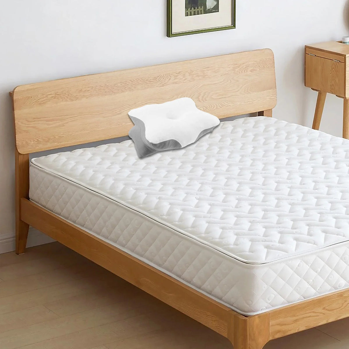 taie d'oreiller mousse mémoire forme papillon ergonomique cou blanc motif géométrique contemporain zip lisse