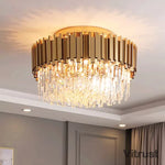 lampe moderne or cristal transparent élégante barres dorées inoxydables salon hall