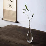 vase verre transparent minimaliste japonais fleurs branches feuilles