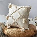 coussin carré beige motif losange texture bouclée décoration maison boho franges
