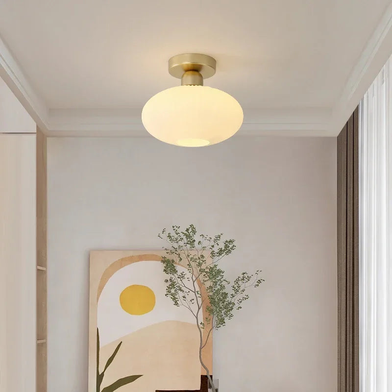 plafonnier moderne minimaliste doré blanc striations verticales opaque lumiere led chambre salon