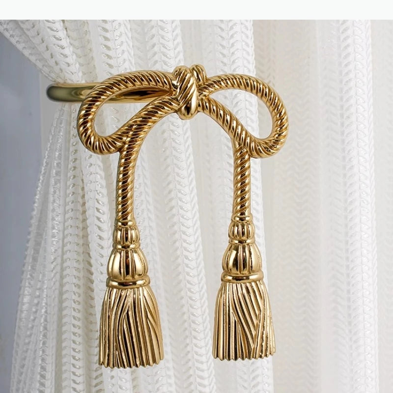 boucles rideau or ailes sculptées classiques décoratives noels dorés deux pièces