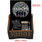 boîte musicale bois naturel motifs floraux 18 tons vintage manivelle horlogerie artisanale