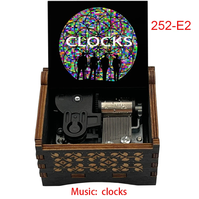 boîte musicale bois naturel motifs floraux 18 tons vintage manivelle horlogerie artisanale