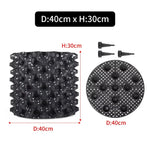 grille drainage plante noir moderne perforations circulaires différentes tailles incluses