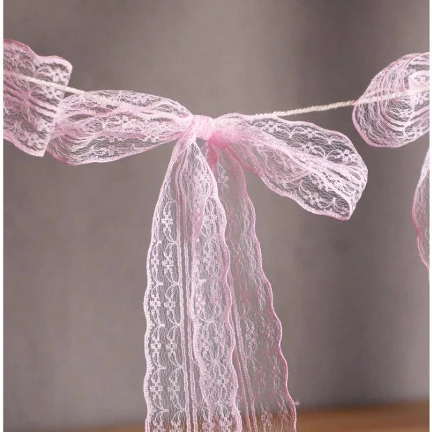 guirlande décorative festives rose noeuds tissu texturé semi transparent mariage anniversaire fille préparation naissance